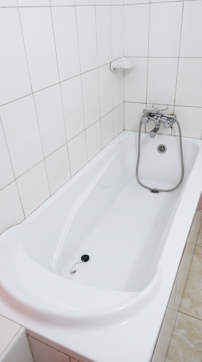 Guest bathroom with bathtub at KABZ HOTEL